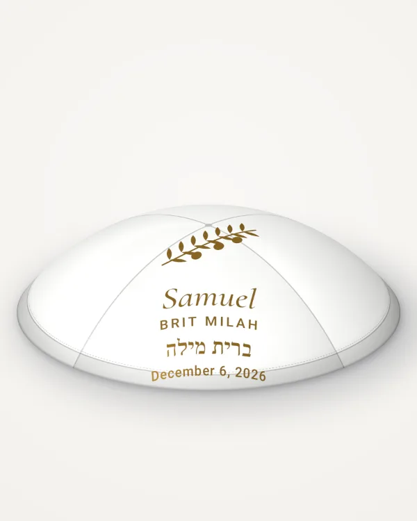 White satin kippah, olive branch design in gold foil with the sample text “Samuel”, rendered picture