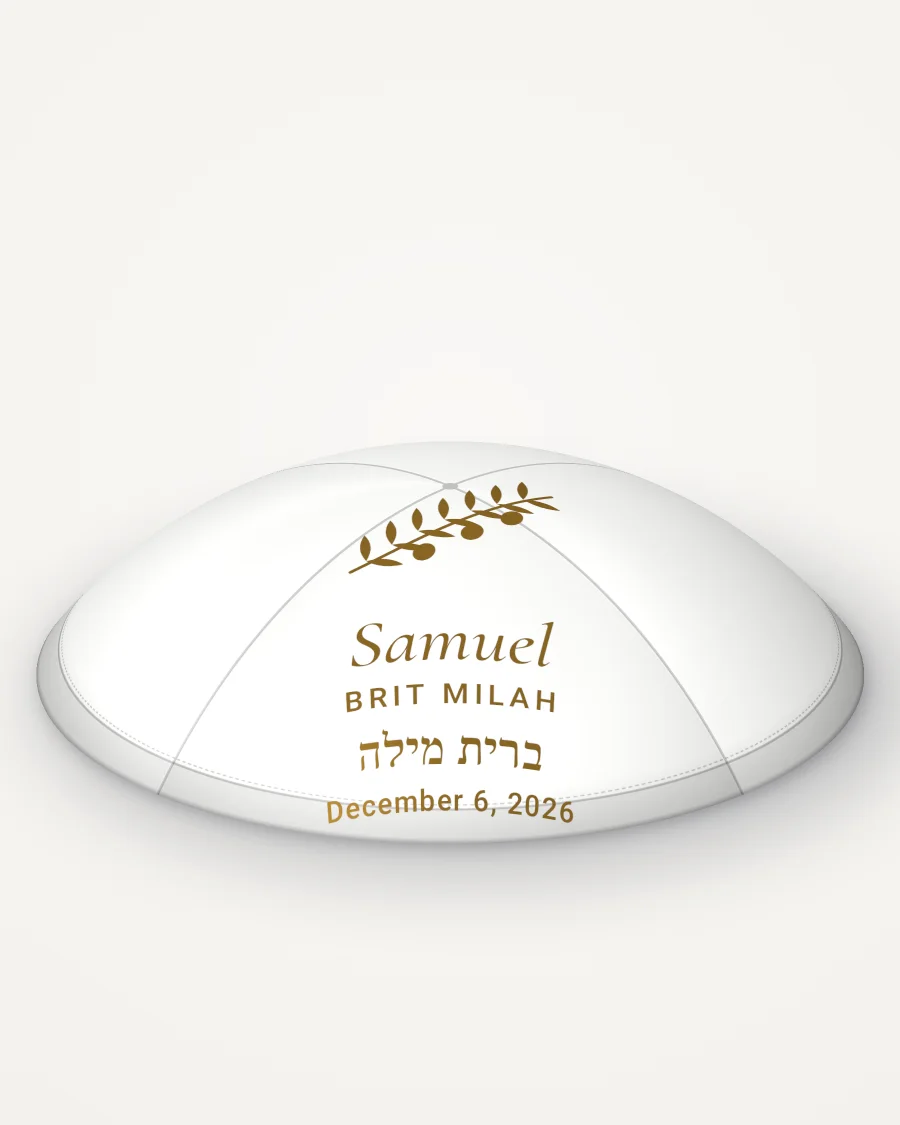 White satin kippah, olive branch design in gold foil with the sample text “Samuel”, rendered picture