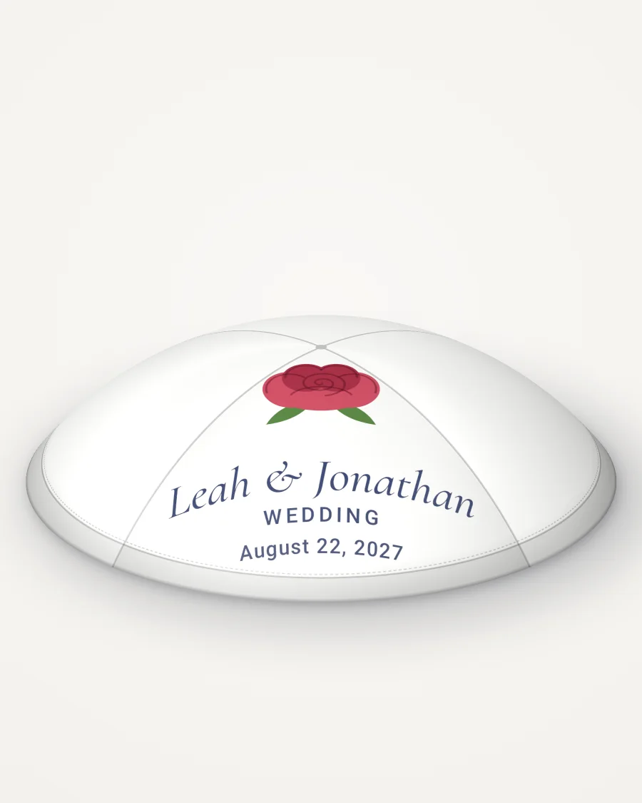 White satin kippah, red rose design in full colour with the sample text “Leah & Jonathan”, rendered picture