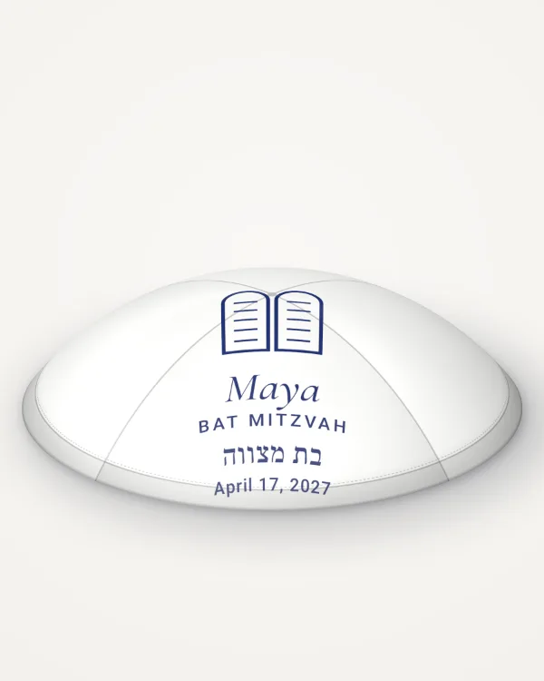 White satin kippah, tablets design in navy ink with the sample text “Maya”, rendered picture