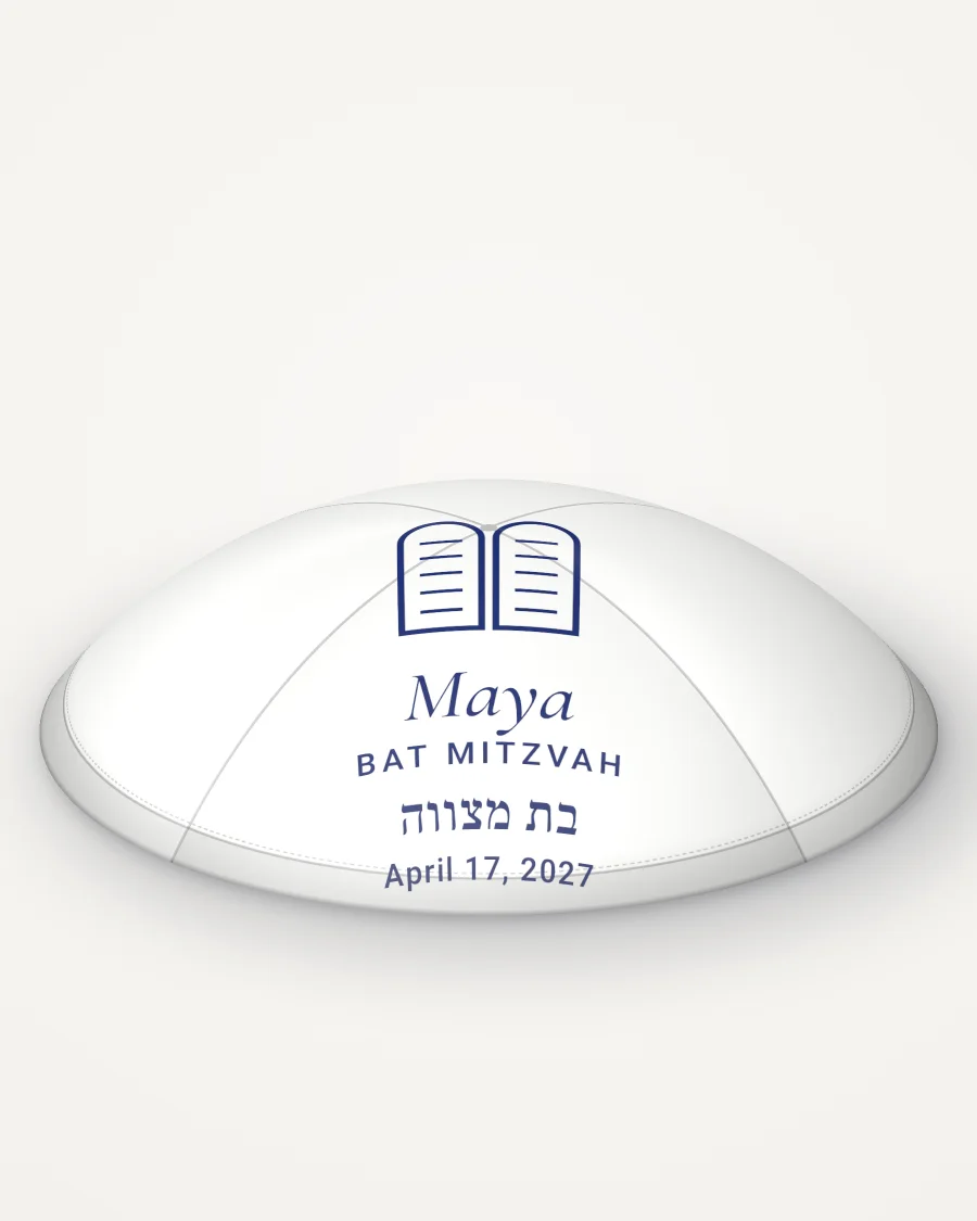 White satin kippah, tablets design in navy ink with the sample text “Maya”, rendered picture
