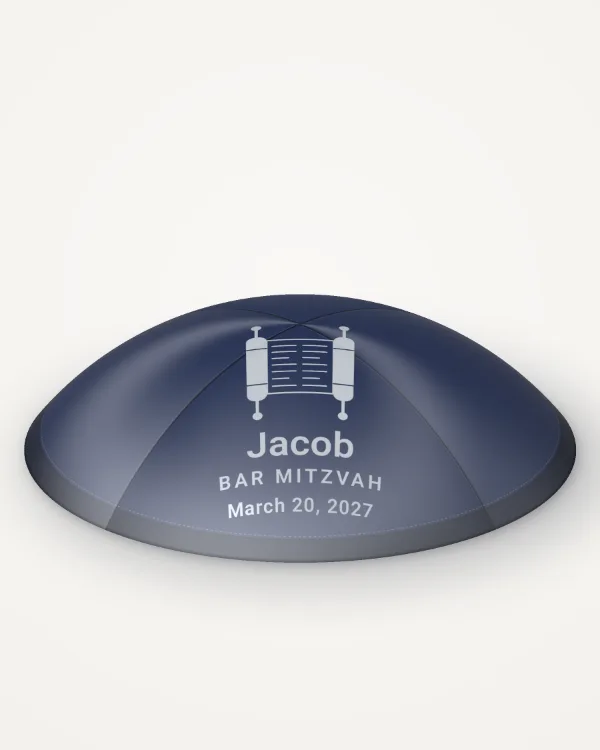 Navy satin kippah, torah scroll design in silver foil with the sample text “Jacob”, rendered picture