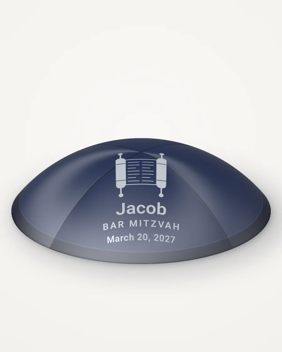 Navy satin kippah, torah scroll design in silver foil with the sample text “Jacob”, rendered picture