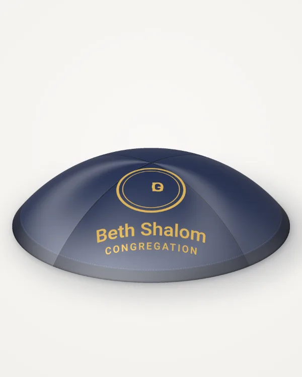 Navy satin kippah, your logo design in gold foil with the sample text “Beth Shalom”, rendered picture