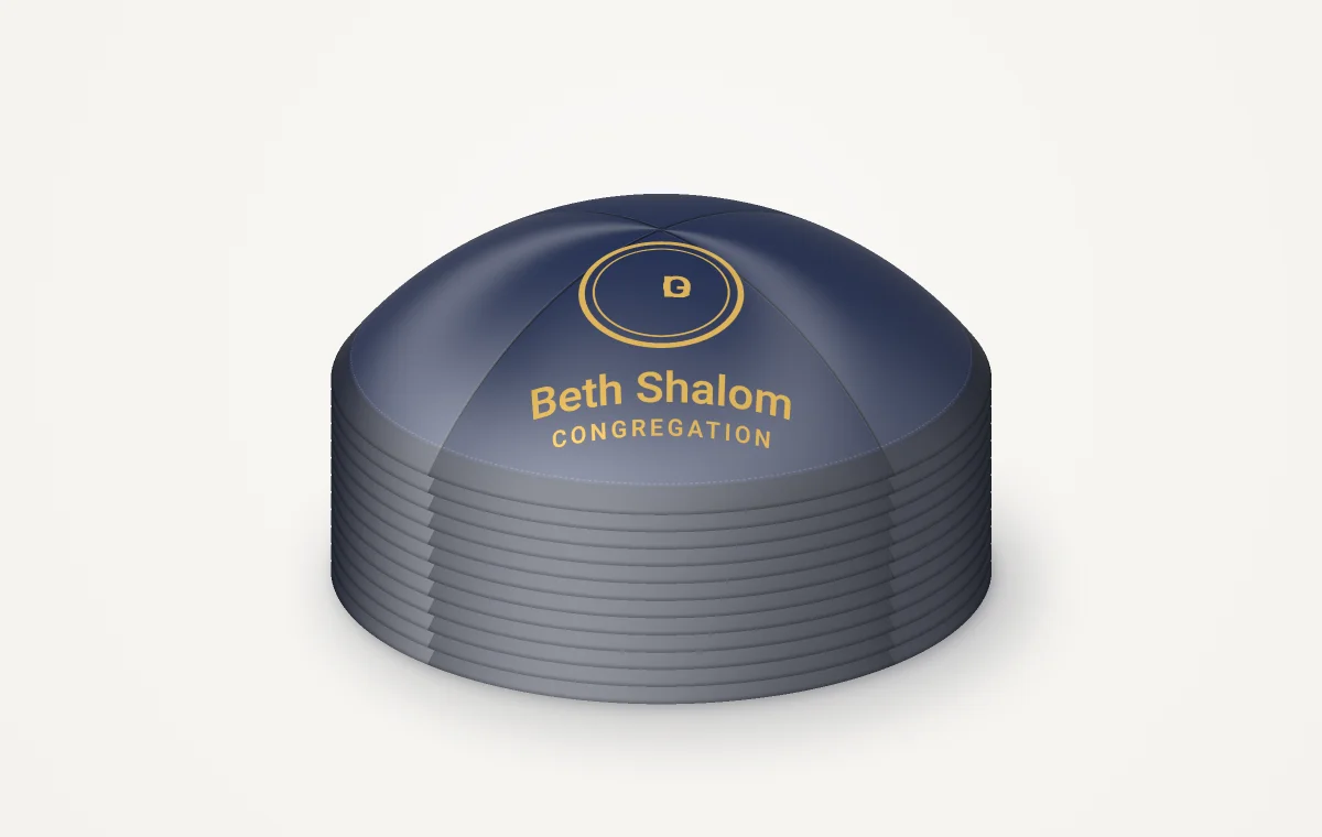 A tall stack of navy kippahs with a gold logo placeholder, rendered picture